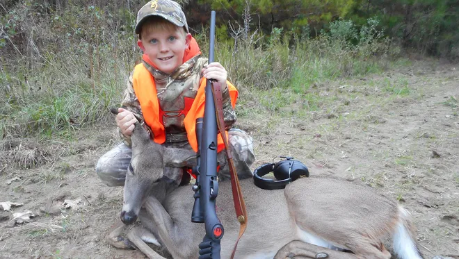 deer hunting rifle boy - Clarion Ledger